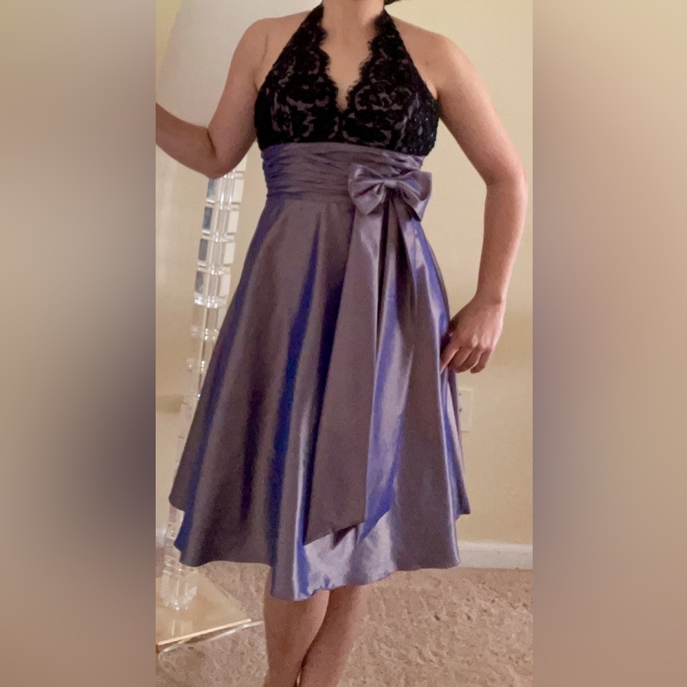 Super Flattering halter dress by JS boutique size 4, black sequin and front bow